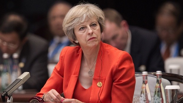 British Prime Minister commits to resolving migrant crisis  - ảnh 1